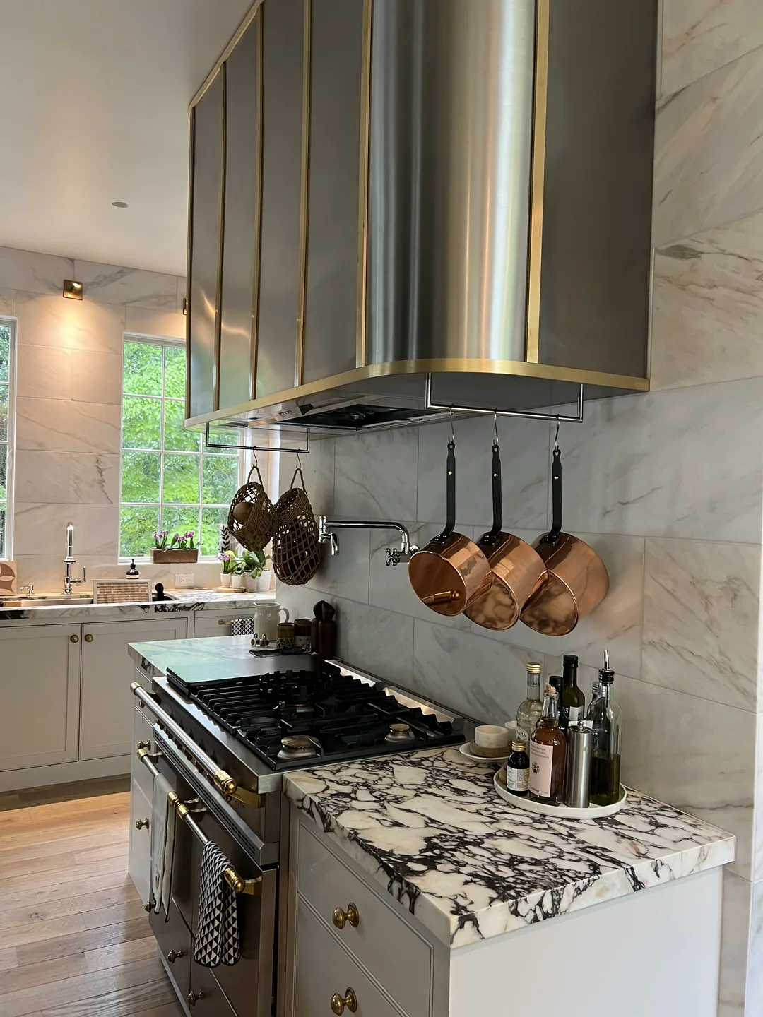 Gourmet kitchen range and hanging cookware