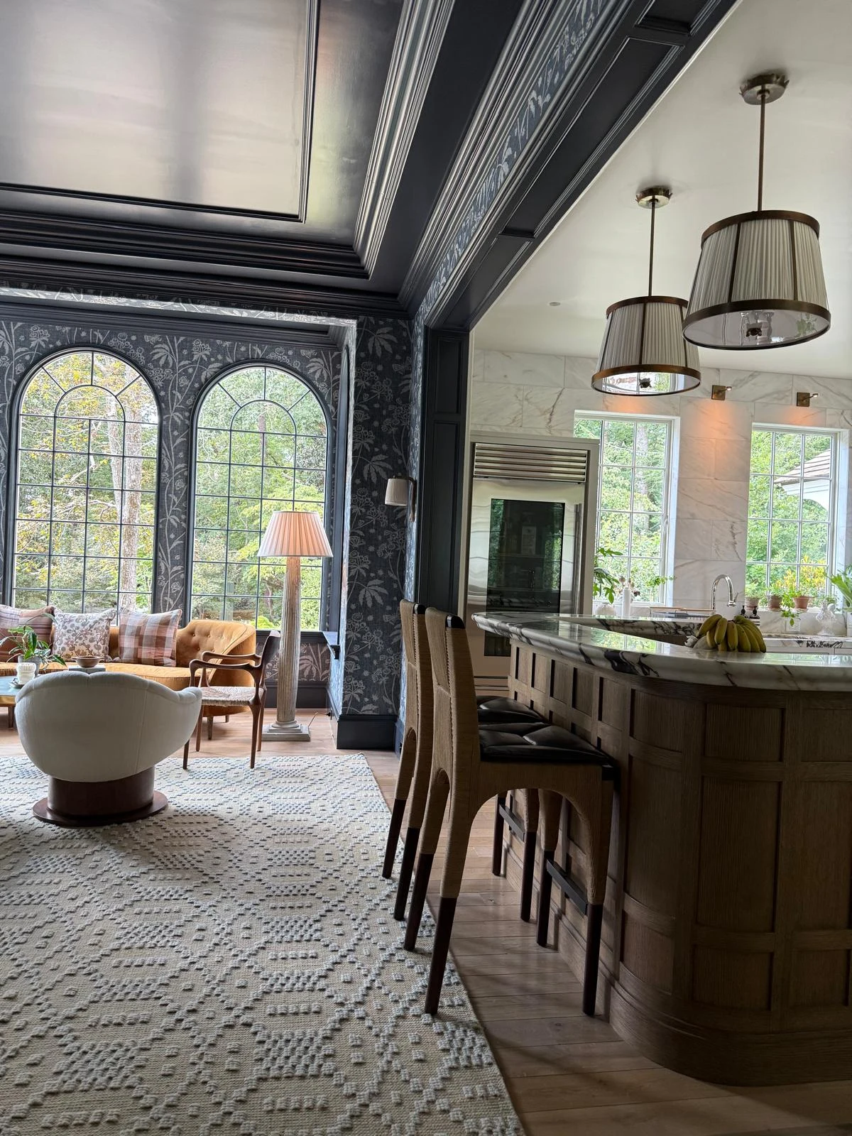 Spacious stone kitchen island and conservatory sunroom in pristine condition
